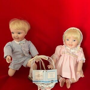 Porcelain boy and girl dolls